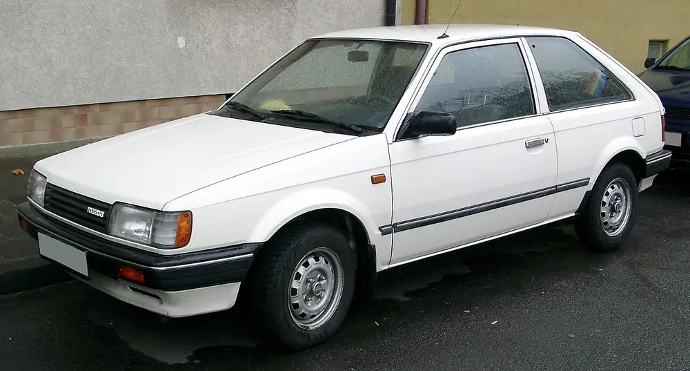 Mazda 323 1986 · 1.6 L · 4 cylinders · Regular Gasoline · (FFS) · Automatic 3-spd · Front-Wheel Drive